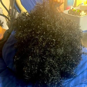 It’s a black curly weave
